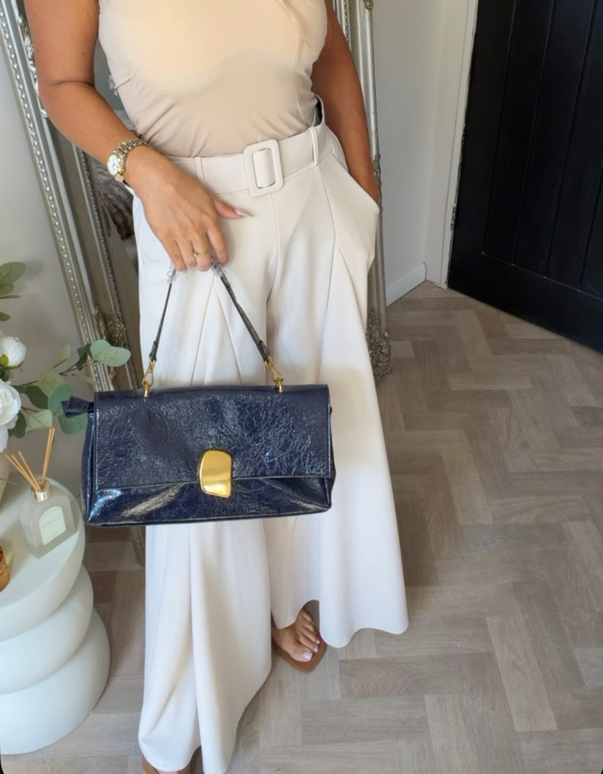 Navy gold statement bag