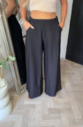 Black stretch tailored trousers (size S/M/L/XL)